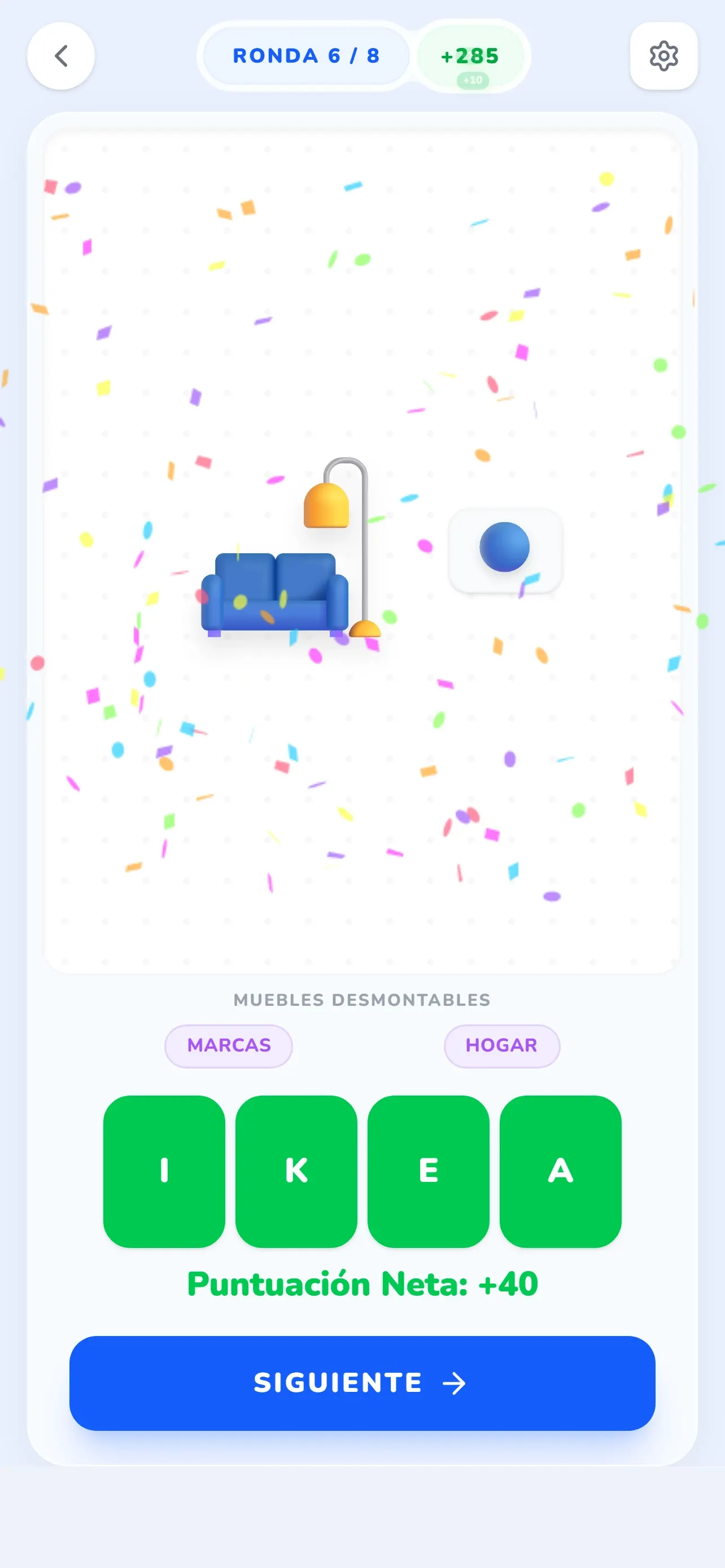 Puzle de Glifio resuelto: emojis de sofá y círculo azul forman IKEA